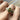 skinny wrists Silver ring with green peridot gemstones on a finger