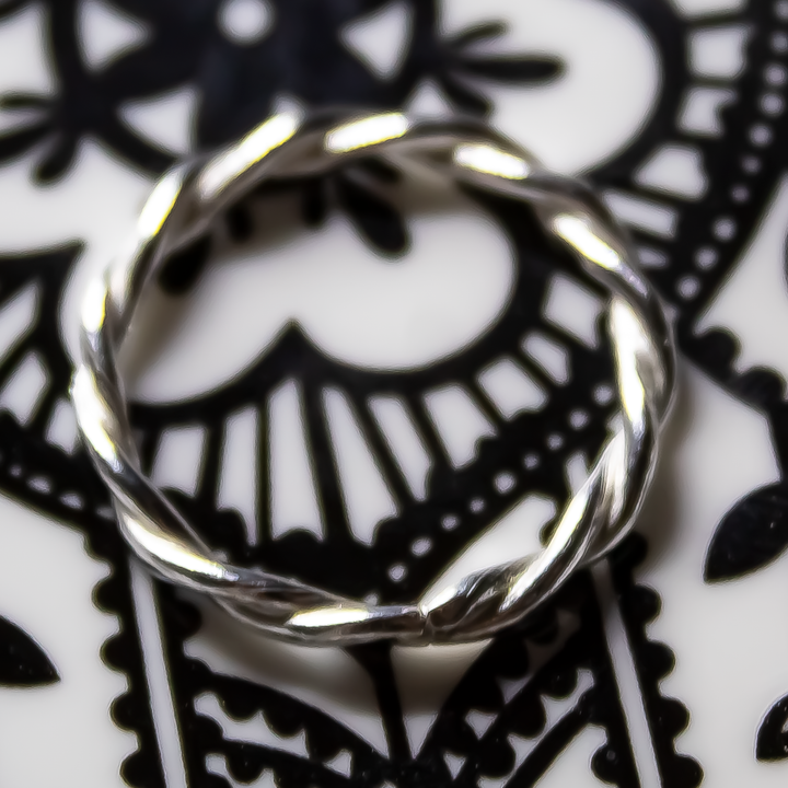 Twisted Stacking Rings