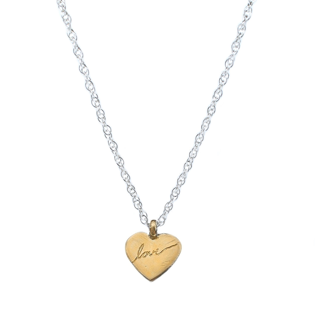 The love heart in gold rope chain
