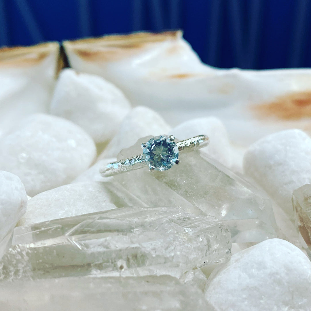 Topaz Baby Treasured Claw Ring