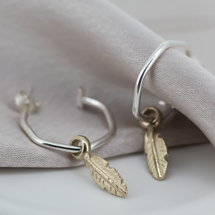 Gold Baby Feather Charms on Silver Hoops