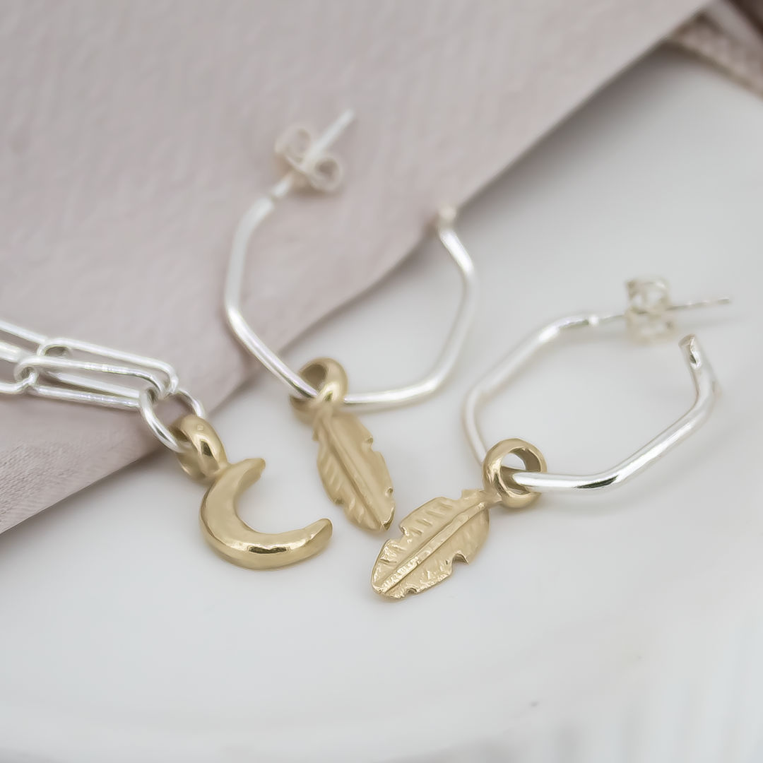 Gold Baby Feather Charms on Silver Hoops