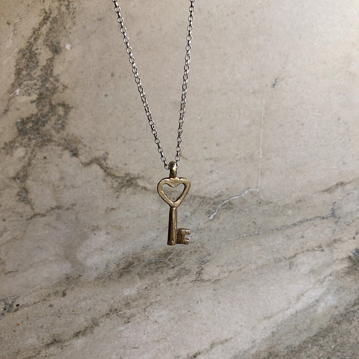 Gold Key on Silver Chain